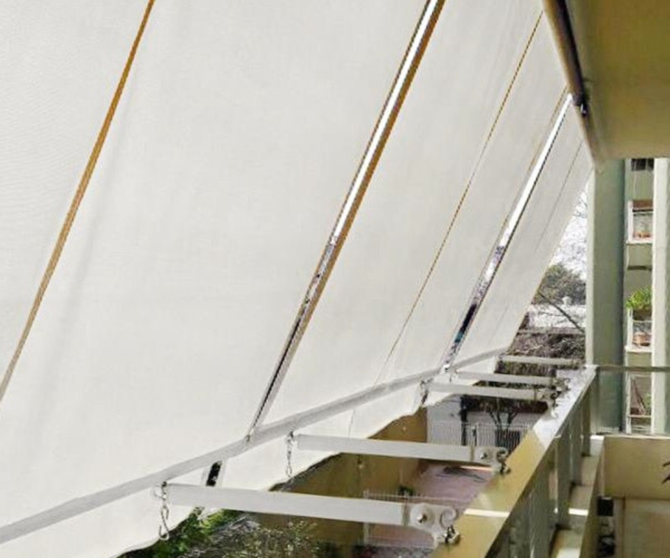 reparar la tela de un toldo